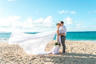 a bride and groom at their beach destination wedding