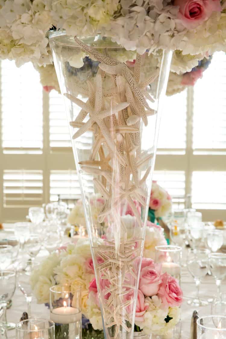 Stunning centerpieces with starfish detail in the vase