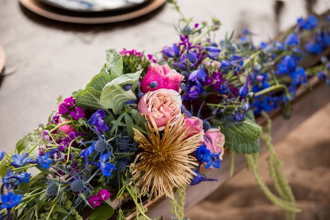 Beach wedding inspiration - stunning jewel toned flowers