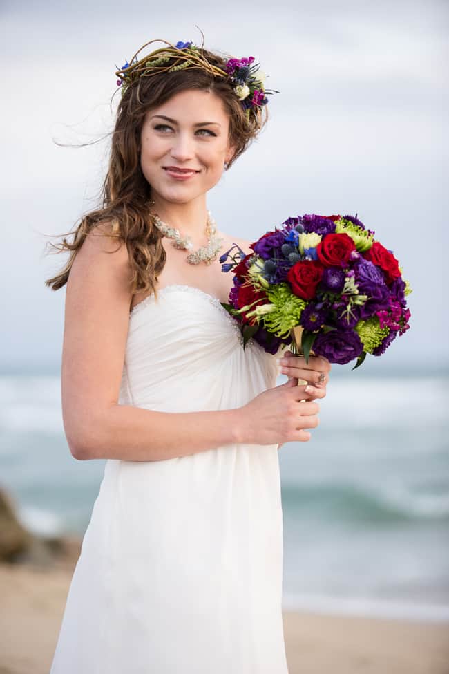 Jewel toned beach wedding bouquet and hair crown