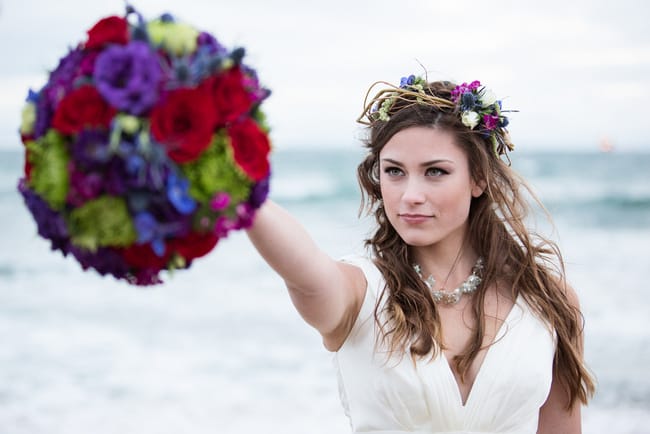 Stunning jewel toned beach wedding flowers and hair crown