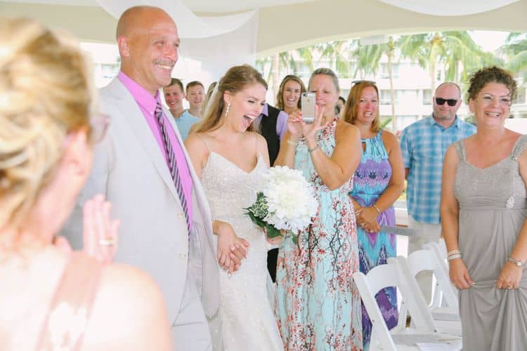 Father walking the bride down the aisle