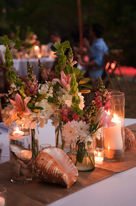 Simple but cute beach themed centerpiece, cylinder vases, beach shell and  sand centerpiece, Tall candl…